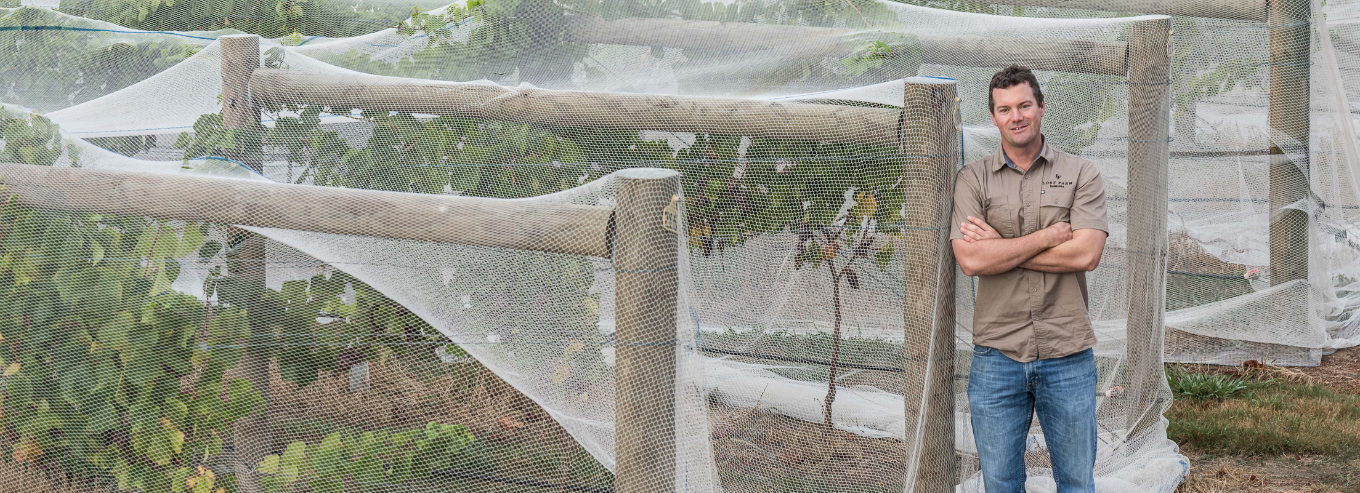 Man posing in Lost Farm Wines vineyard